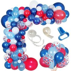 balloons and confetti are arranged in the shape of a wreath