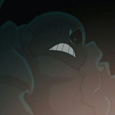 an animated image of a monster with its mouth open and eyes wide open in the dark