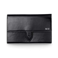 Deluxe Travel Wallet in Black | Aspinal of London Designer Travel Wallets With Interior Card Slots, Modern Trifold Travel Wallet, Luxury Travel Clutch, Classic Bifold Wallets For Travel, Classic Travel Accessories With Interior Card Slots For Business, Classic Leather Rectangular Travel Accessories, Classic Rfid Blocking Travel Accessories For Daily Use, Luxury Bifold Business Wallets, Classic Rectangular Business Travel Accessories