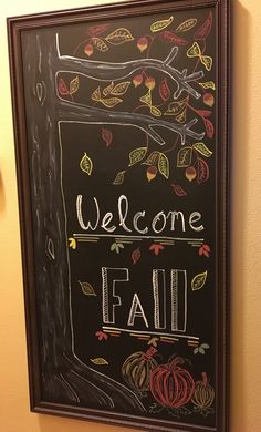 a chalk board with the words welcome fall written on it