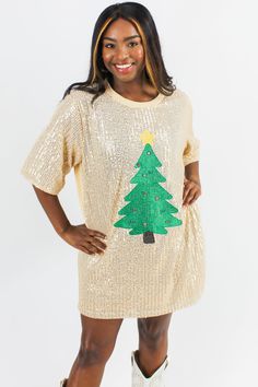 Get ready to glow this holiday season in this dazzling dress! The Christmas tree on this sequin dress makes for a festive look! Style with gold jewelry and boots to complete the outfit!  Runs True to Size Model is 5'2" & Wearing a Size Small Material: 100% Polyester Hand Wash Cold, Hang to Dry Do Not Bleach Importe Christmas Sequined Holiday Dress, Sequin Christmas Holiday Dress, Sequin Holiday Shirts, Holiday Festive Sequin Fabric, Women’s Sequin Grinch Dresses, Sequin Christmas Tree, Christmas Tree Dress, Tree Dress, Dazzling Dress