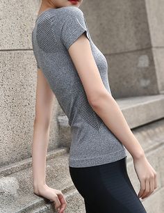 Stretchy, soft sport workout top. Large fits as a medium 92% Nylon, 8% Spandex Stretch Moisture-wicking Activewear For Light Sports, Stretch Activewear For Light Sports, Stretch Sportswear For Light Sports, Stretch Activewear With Seamless Construction, Seamless Stretch Activewear For Sports Season, Seamless Stretch Activewear For Sports, Versatile Stretch Gray Activewear, Versatile Gray Stretch Activewear, Stretch Gray Sportswear Activewear