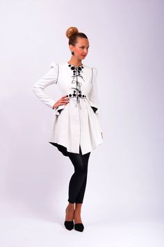 AGATA 2 is a unique and elegant jacket wearable with select occasions it has a serious and feminine look that brings personality to your frame. with lining. AVAILABLE FABRICS: black/WHITE, white/BLACK, dark tan/BLACK, NOTE: flower shapes may vary slightly. The products are made to order so any size will be ready for shipping in 2-3 weeks after payment. If you don't have a standard size, please send me your measurements following the instructions from this video: https://www.youtube.com/watch?v=T Girly Coats, Laura Galic, Haute Couture Coat, Street Jacket, Wool Wrap Coat, Flower Shapes, Elegant Jacket, Collarless Jacket, Linen Jackets