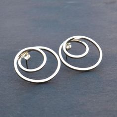 These Modern and Classic Stud Earrings are made of 925 sterling silver, They are simple and stylish. These Geometric Spiral Hoop Earrings are handmade. They are lightweight so It won't even feel like you're wearing earrings, but you'll still standout. a Push Back Closer is soldered at the top of each Spiral Circle. Stuff Type: Spiral Hoop Studs Earrings Metal : 925 Sterling silver Benefits of silver: According to study, wearing silver has helped in balancing moods and increasing energy levels. T Modern Circular Hoop Earrings For Anniversary, Modern Hoop Earrings For Anniversary, Modern Circle Hoop Earrings For Anniversary, Minimalist Circle Earrings For Anniversary, Modern Anniversary Hoop Earrings, Silver Open Circle Earrings For Gift, Simple Sterling Silver Earrings As Gift, Sterling Silver Simple Design Earrings For Gift, Sterling Silver Open Circle Earrings For Anniversary