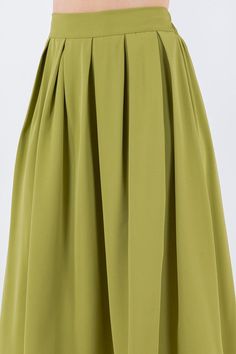 Vintage vibes with our box pleats midi skirts. Wear yours with a graphic t-shirt and sneakers, or dress it up with a fitted top and heels. Make it your own style for any occasion. Fit is true to size. Waistband has back elastic for stretch. Fabric: 100% polyester. Spring Trendy A-line Pleated Skirt, Casual A-line Pleated Skirt With Accordion Pleats, Trendy Summer Full Pleated Skirt, Trendy Full Pleated Skirt For Summer, Casual A-line Accordion Pleated Skirt, Spring Solid Pleated Skirt With Pleated Hem, Green A-line Pleated Lined Skirt, Spring Midi Bottoms With Box Pleat, Spring Midi Length Bottoms With Box Pleat