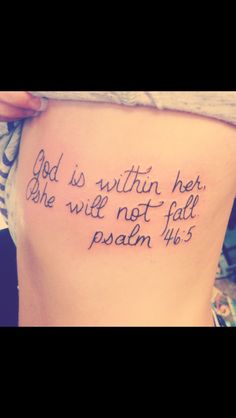 a woman's thigh with the words god is within her she will not fall