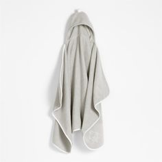 a gray towel hanging on the wall