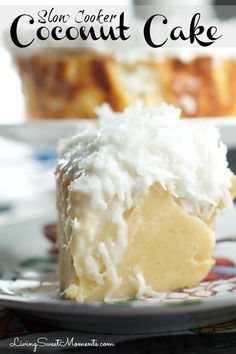 a piece of coconut cake on a plate with the rest of the cake in the background