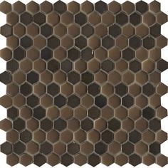 a brown mosaic tile with hexagonal shapes