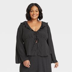 This Long-Sleeve Tie-Front Ruffle Top from Ava & Viv™ in black with a white dot print adds extra charm to your wardrobe. Fashioned in a casual fit, it features a deep V-neckline with ruffle detailing and a tie front for added flair. The lightweight fabric offers a comfortable drape, and it can be paired with your choice of jeans, pants or skirts and your favorite footwear to create a range of versatile outfits. Tie Front Blouse, Versatile Outfits, Shop Blouses, Ruffle Top, Womens Clothing Sizes, Short Sleeve Blouse, Casual Fits, Sleeve Styles, Women Long Sleeve