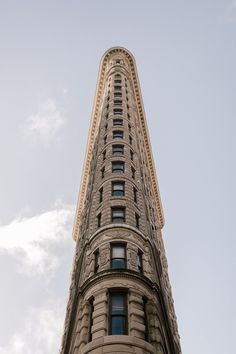 an upward view of the top of a tall building