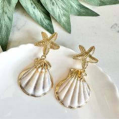 Gold Seashell Starfish Caspian Collection Earrings European Beachy Jewelry New Brand New See Pictures For Measurements! Zinc Alloy Material Even Prettier In Person, Perfect For Casual Or Special / Formal Occasions I Love To Bundle! Contact Me For Bundle Pricing Before Purchase! Inventory Bin 8 Rhinestone Bling Cute Nature Stud Small Dainty Formal Wedding Birthday Party Gift Festival Spring Summer 2024 Trends Trendy Casual Statement Fashion Cocktail Jewel Chandelier Elegant Bohemian Boho Style Fo Starfish Jewelry For Vacation, Beachy Gold Dangle Earrings, Starfish Shell Jewelry, Gold Dangle Earrings For Beach Season, Gold Earrings For Beach Season, Beachy Gold Shell Earrings, Gold Ocean-inspired Beach Earrings, Gold Starfish Shell For Beach, Gold Shell With Starfish Charm For Beach