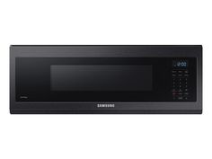 a black samsung microwave oven with the door open and timer on it's side