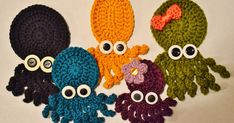 four crocheted octopus toys with googly eyes