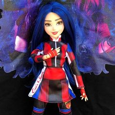 a doll with blue hair is standing in front of a black background and purple wings