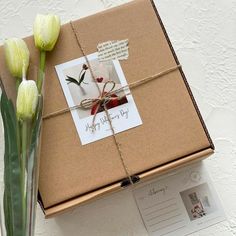 a brown box with some flowers in it