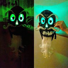 two pictures of masks with glowing eyes and hair