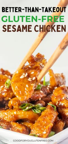 chicken with sesame seeds and chopsticks in a white bowl on top of a table