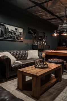 a living room filled with furniture and a pool table