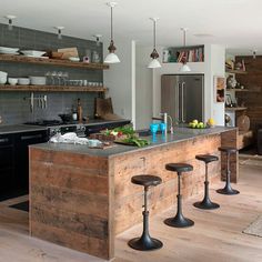 Maybe don't need cupboards in the kitchen. love the look of this Wraparound wood on outside of kitchen island Pair with concrete or white zodiac corian counters. House In The Hamptons, Rustic Beach House, Industrial Kitchen Island, Bar Exterior, Industrial Kitchen Design, Industrial Style Kitchen, Kitchen Island Design, Island Ideas, Industrial Kitchen