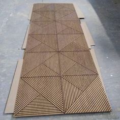 the floor is made out of wood and has an intricate pattern on top of it