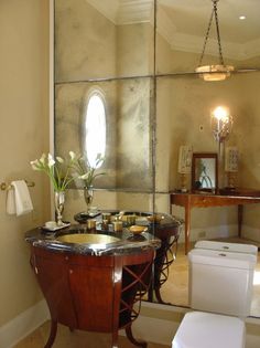 the bathroom is clean and ready to be used as a home office or guest room