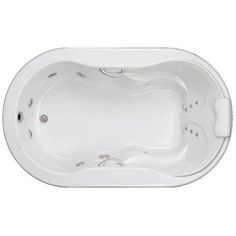 an oval shaped bath tub with two jets