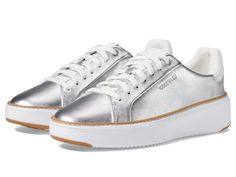 PRICES MAY VARY. Inspired lace up sneaker silhouette in premium leather, suede, and textiles Ideal Fit: A traditional Saachetto construction with removable footbed for versatile fit Enhanced Breathability: Medial ventilation Silver Sneakers, Shoes Silver, Cole Haan Women, Cole Haan Men, Silver Shoes, Kids Luggage, Fashion Sneakers, Pharmacy Gifts, Cole Haan