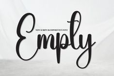 the word empty written in cursive black ink on a white background with some type of writing