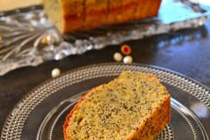 a loaf of poppy seed bread on a plate