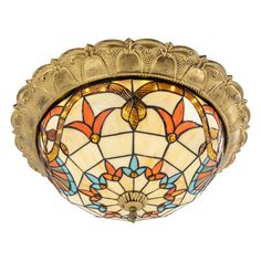 an ornately designed ceiling light fixture with stained glass and gold trim, on white background