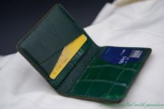 This credit card holder is made of genuine alligator leather and Alran goat leather. The alligator leather is tanned in the highest quality and finished in a very nice green color. It's free from decoloration. The Alran goat leather is well known as one of the best goat leather all over the world. It has a soft touch feeling and deluxe color. DESIGN: This wallet has 1 card slot on the outside for your frequently used card. + 4 card slots on the inside. + 2 hidden slots for folded cash or ID card Luxury Green Wallet With Bill Compartment, Luxury Green Wallets With Rfid Blocking, Green Luxury Card Holder With Interior Slots, Luxury Green Wallet With Rfid Blocking, Green Luxury Wallets With Interior Card Slots, Luxury Green Wallets With Interior Card Slots, Green Luxury Wallet With Interior Card Slots, Luxury Green Wallet With Interior Card Slots, Luxury Green Wallets With Card Slots