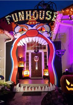 an entrance to a house decorated for halloween