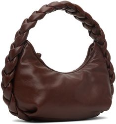 Handcrafted buffed lambskin top handle bag in brown. · Padded braided detailing throughout · Fixed shoulder strap · Zip closure · Patch pocket at interior · Organic cotton canvas lining · H6.5 x W12 x D2.5 · Total height: H11.5 Supplier color: Chestnut Luxury Brown Hobo Bag With Braided Handles, Leather Top Handle Bag With Braided Details, Leather Top Handle Shoulder Bag With Braided Detail, Braided Leather Top Handle Shoulder Bag, Braided Leather Shoulder Bag, Brown Leather Braided Shoulder Bag, Brown Braided Leather Shoulder Bag, Interior Organic, Chanel Waist Bag