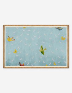 a painting with birds flying in the sky on a light blue background, framed above a wooden frame