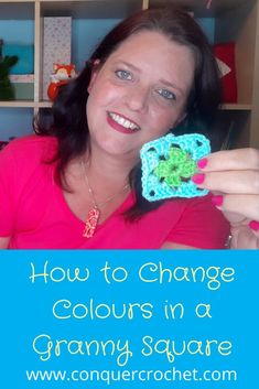 a woman holding up a crochet square with the words how to change colours in a granny square