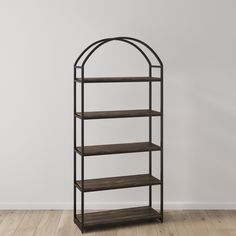 an iron and wood shelf with three shelves on each side, against a white wall