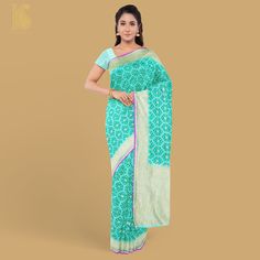 An exclusive Banarasi saree from Khinkhwab. Add a dash of your favorite color to your ethnic look with this beautiful Banarasi saree from our georgette collection. The Saree is made of pure Georgette silk and has the illustrious motifs weave. Green Zari Weaving Georgette Traditional Wear, Green Georgette Traditional Wear For Puja, Elegant Georgette Saree With Traditional Patterns, Festive Meenakari Traditional Wear In Georgette, Traditional Georgette Saree With Patterns, Semi-stitched Georgette Saree With Traditional Patterns, Traditional Georgette Wear With Meenakari Drape, Georgette Traditional Wear With Meenakari, Traditional Meenakari Georgette Wear