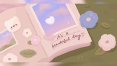 an open book sitting on top of a grass covered ground next to pink and blue flowers