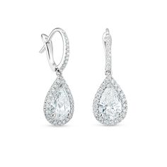 Elegant and eye-catching, this pair of diamond earrings from the De Beers Aura collection is composed around two exceptional pear-shaped diamonds. Each one is selected by eye and precisely matched by our team of experts to ensure harmony and balance. The diamonds are prong-set in 18K white gold and delicately encircled by a row of micropavé diamonds. Their hoops, too, are lined with micropavé diamonds, each one meticulously aligned by hand in a frame bespoke for the central diamond. Black Tie Jewelry, Tie Jewelry, Diamond Cufflinks, Gold Diamond Drop Earrings, High Jewelry Ring, Evening Jewelry, Platinum Earrings, High Jewellery, Diamond Necklaces