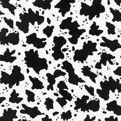 a black and white cow print background