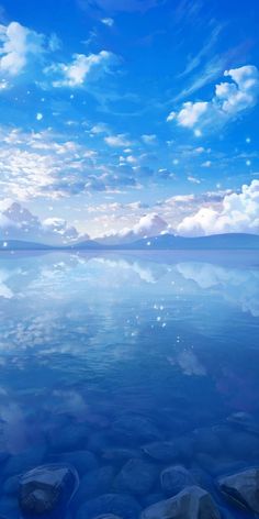 the sky and clouds are reflected in the water