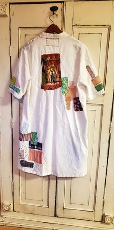 Soft and cozy upcycled white cotton button down shirt / tunic / dress with textile  madonna original artwork patch and large pocket with milagro hearts! extra textile patches! Lots of hand embroidery. large-XLARGE 39 length. 46 bust.  wash dry machine. all embroidery ends have been sealed to prevent freying Applique Tee, Washing Machine And Dryer, Magnolia Pearl, Upcycled Clothing, Tee Shirt Dress, Dress Tunic, Learn To Sew, Upcycle Clothes, Tunic Dress