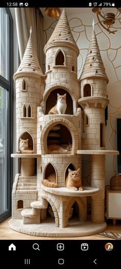 a cat sitting on top of a fake castle