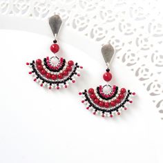 "I created this black red earring by hand, using Swarovski pearls 3mm, Miyuki round seed beads, Miyuki Delica beads and 14k goldfilled push back Closure Stunning, unique and ethnic * Measurements: Earring length: 1.57\" (4cm) Fan element diameter: 1.18\" (3cm) * The earrings will come beautifully packaged for a gift. * For other dangle earrings: https://www.etsy.com/shop/LioraBJewelry/items?section_id=16311270 * my shop: https://www.etsy.com/shop/LioraBJewelry * Shop Policies: https://www.etsy.c Red And Black Beaded Drop Earrings, Red Dangle Jewelry With Bead Caps, Red Jewelry With Bead Caps, Red Earrings With Black Beads As Gift, Red Earrings With Black Beads For Gift, Elegant Red Earrings With Black Beads, Gift Red Beaded Earrings With Bead Caps, Red Drop Earrings With Black Beads, Long Chain Earrings Gold