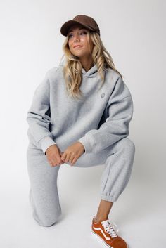 We got nothing but smiles here at ROOLEE :) These soft, french terry sweatpants feature an embroidered smiley face graphic, elastic waistband, + working pockets. The fit on these is perfect for cozying up next to the Christmas tree or running around town getting your Christmas shopping done. Grab the matching hoodie to make this a set you'll try very hard not to wear every day (we totally understand if you do though). The gold material will not only spread smiles but also make you feel as bright Smile Face Sweatpants, Embroidered Smiley Face, Smiley Hoodie, Smiley Face Graphic, Beautiful Imperfections, Face Graphic, Resort Collection, Plus Size Shopping