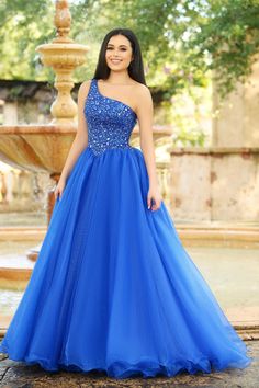 Looking for a show-stopping prom dress? Look no further than the Ava Presley 37385! This gorgeous gown features a fitted bodice with intricate beadwork and a flowing skirt that is sure to make you feel like a princess on your big night. Plus, the built-in corset ensures that you'll look absolutely stunning from every angle. Trust us, this is one dress that you won't want to miss out on! Organza Styles, Plastic Dress, Prom Ideas, Floor Length Skirt, Asymmetrical Neckline, Layered Skirt, Dress Cover, Gorgeous Gowns, Evening Dresses Prom