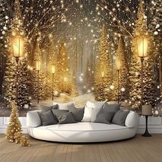 a living room with a couch and christmas trees on the wall in front of it