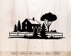 a wooden cutting board with a house and trees