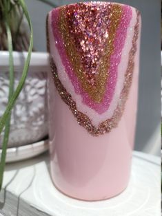 two different shots of pink and gold glittered coffee mugs next to each other